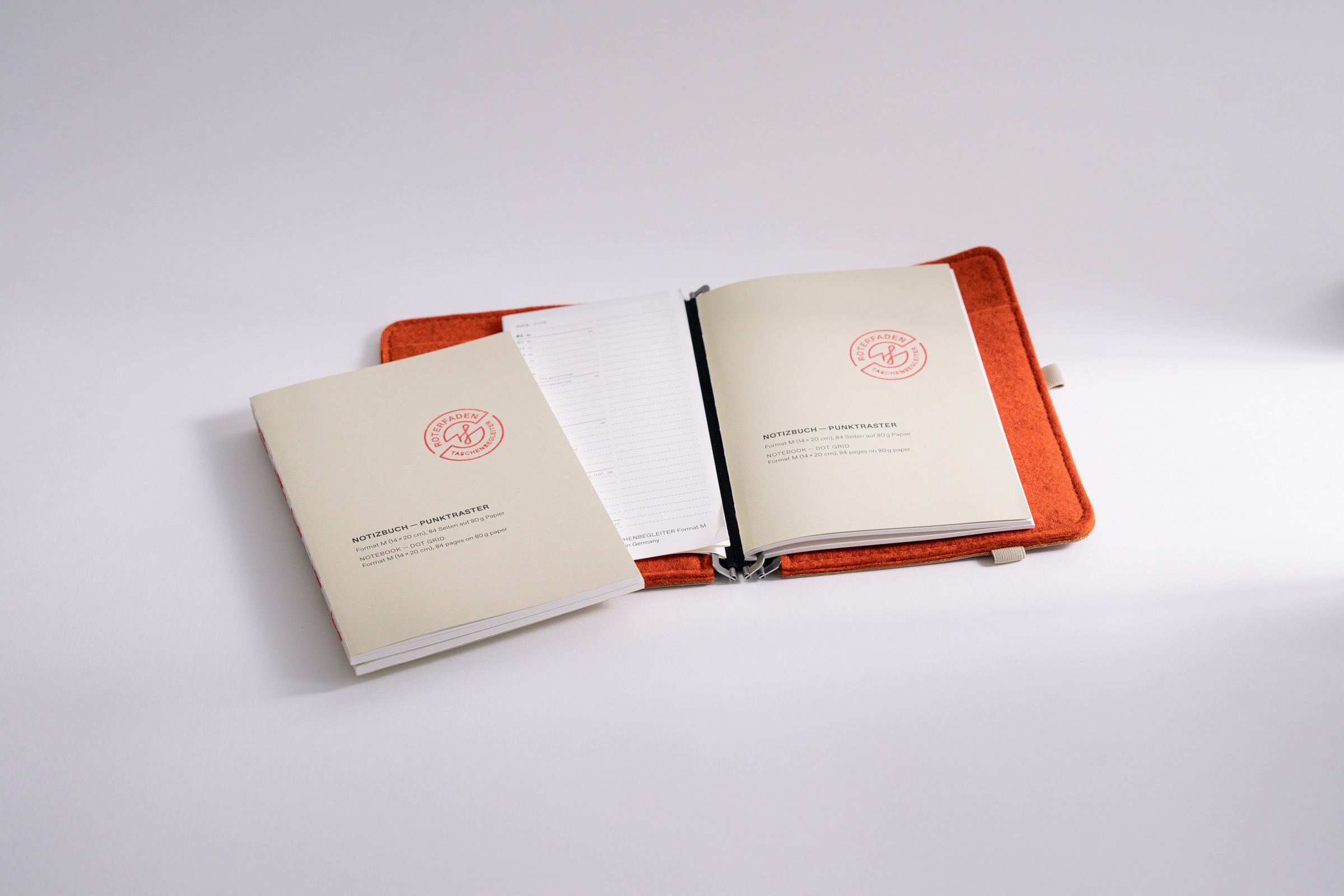 Roterfaden notebook with sturdy recycled cardboard cover, available in various sizes in dot grid or blank. Natural white paper.