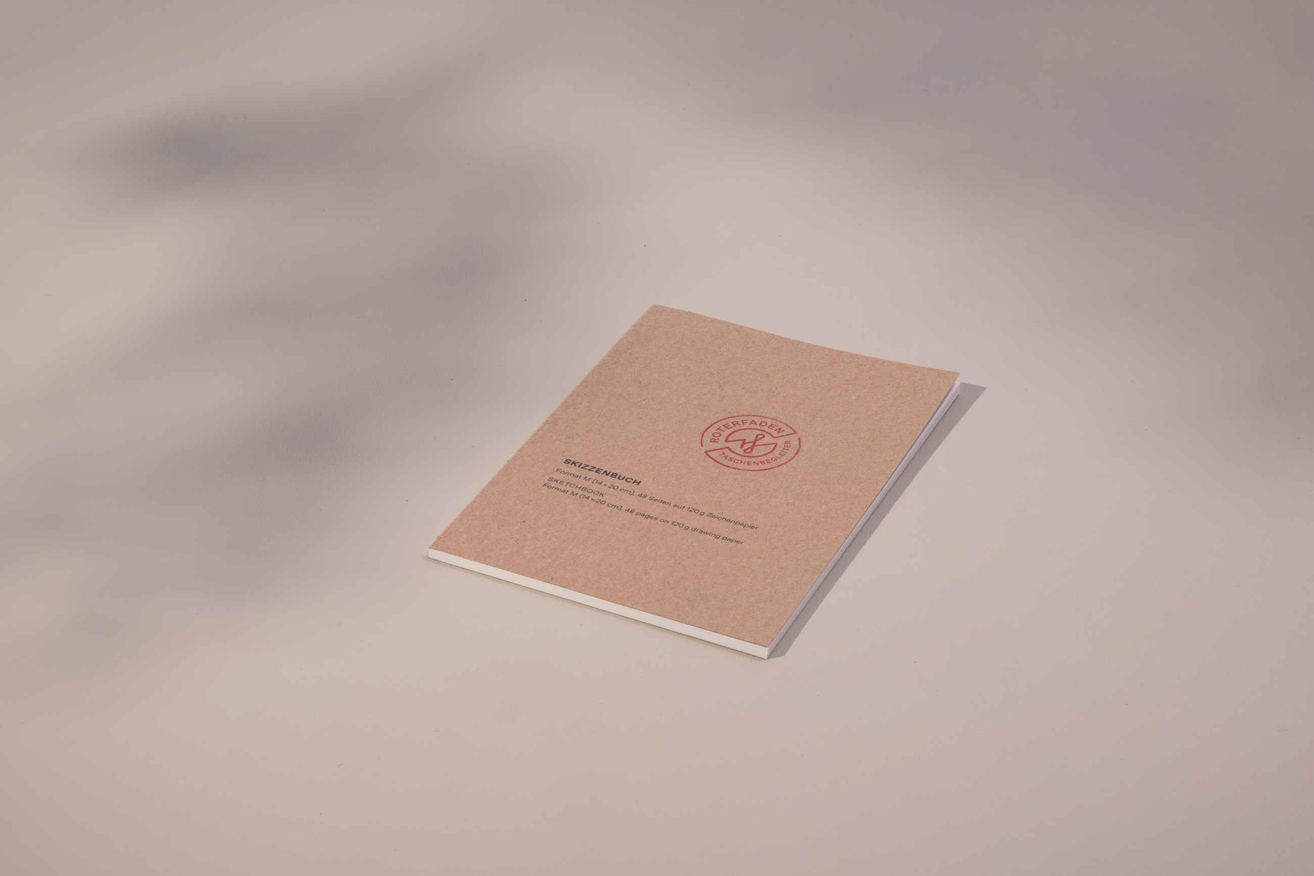 Thread-bound sketchbook in A5 size with 48 pages of natural white, 120gsm drawing paper and sturdy cover made from recycled cardboard. Lies flat when open.